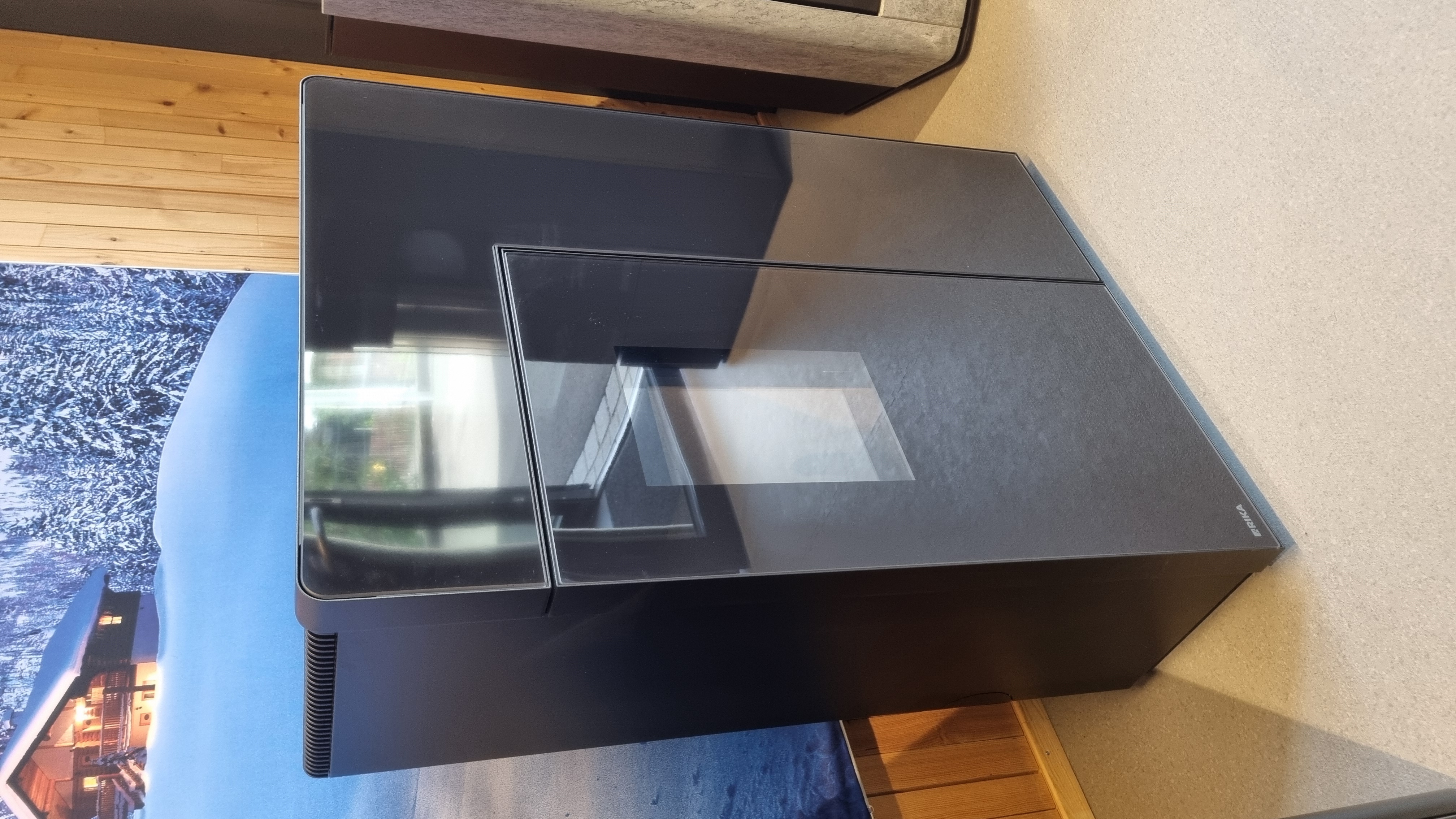 Rika Pelletofen Domo in Dekorglas Schwarz - Ausstellungsstück Rika Pelletofen Domo in Dekorglas Schwarz - Ausstellungsstück
